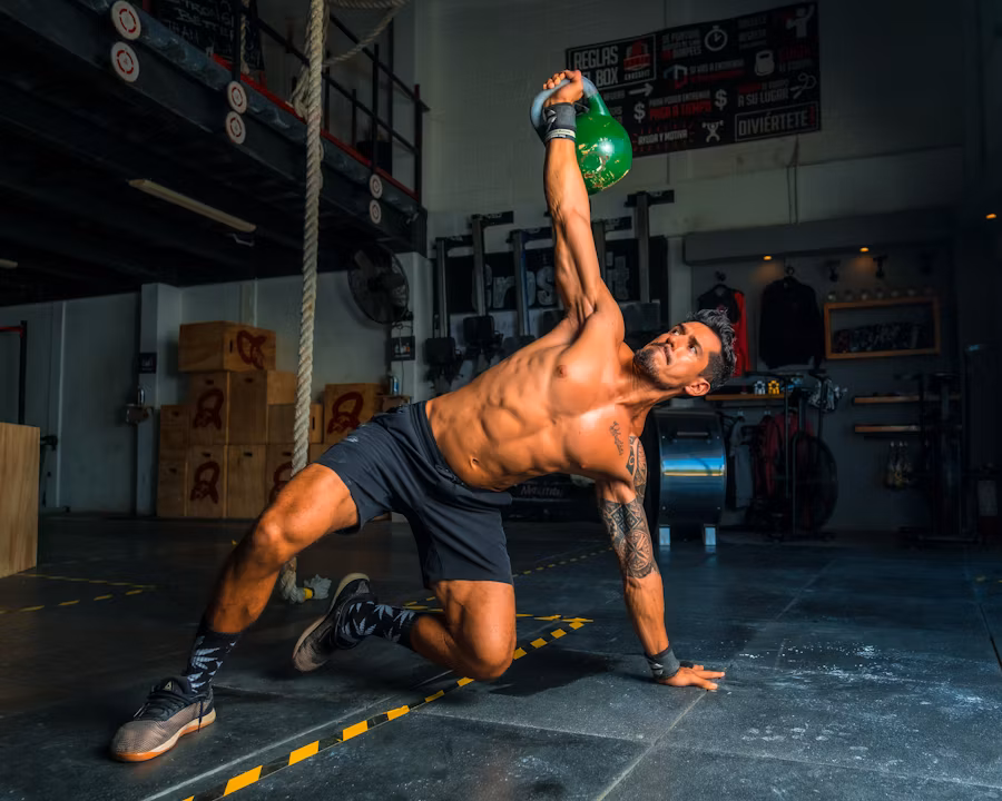 Woman lifting weights in a gym